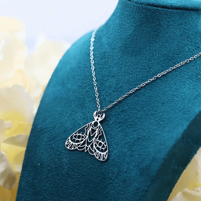 Cut out moth necklace