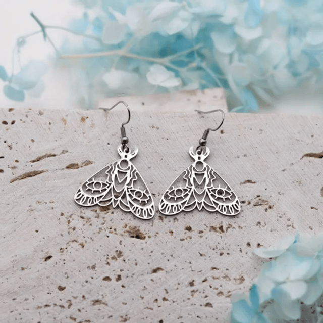 Cut out moth earrings
