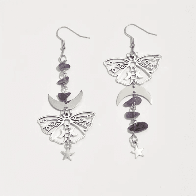 Moth earrings with purple gemstones